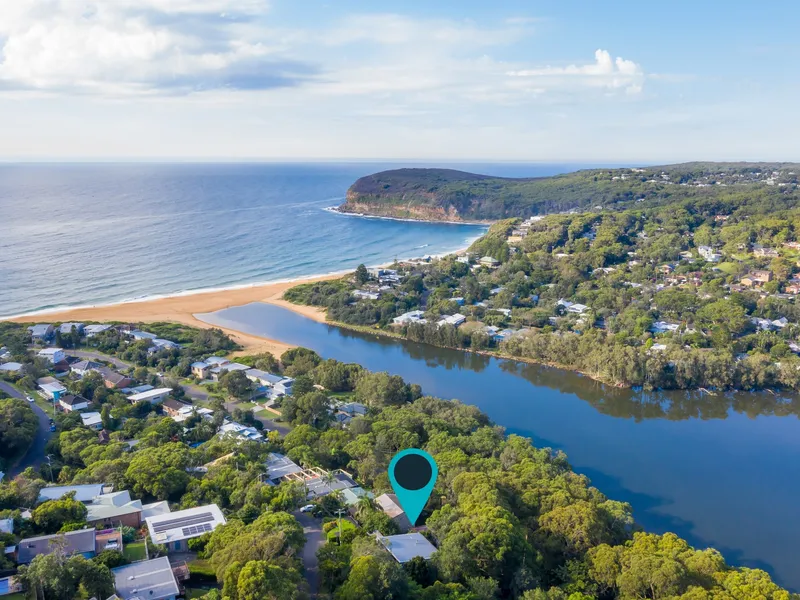 5 minute walk to beach with dual water views + studio