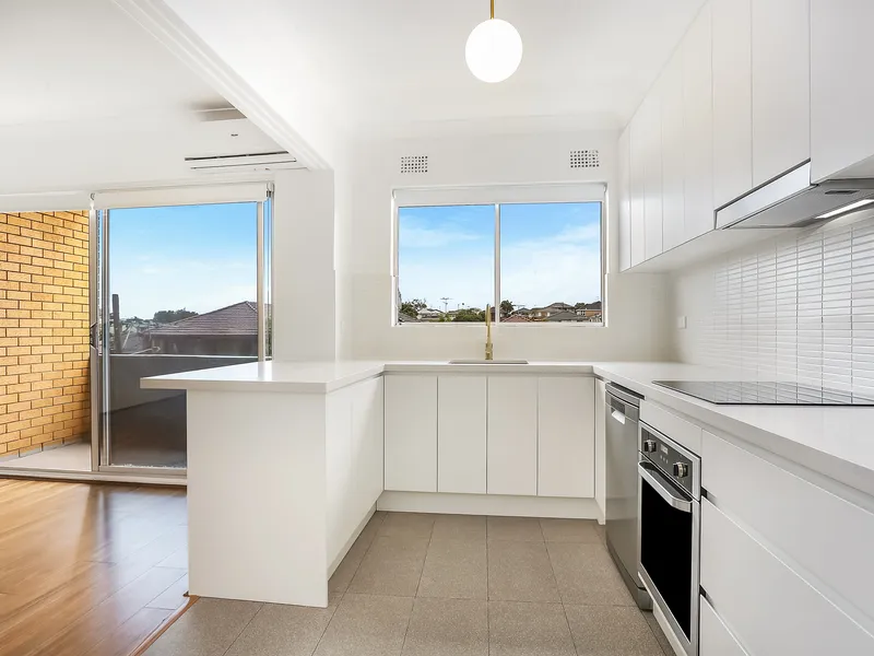 Sun drenched freshly renovated apartment with lock up garage