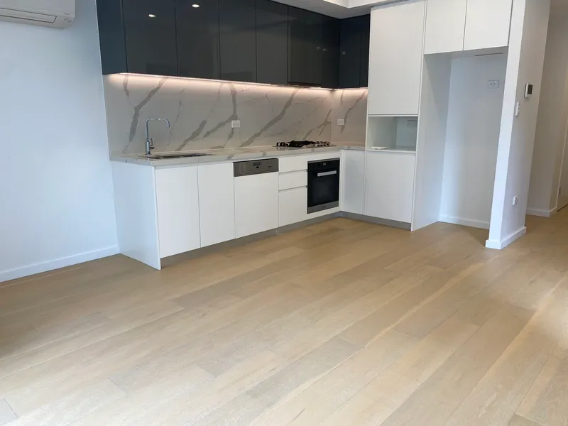 Stylish One Bedroom Apartment Timber Floor Throughout