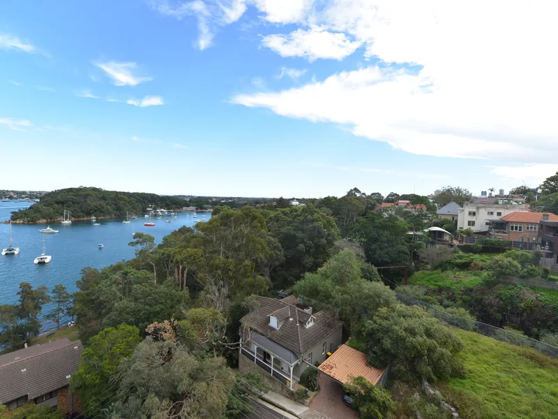 UNIQUE LOCATION _ TOP FLOOR UNIT WITH WATER VIEWS FEW MINUTES WALK TO STATION