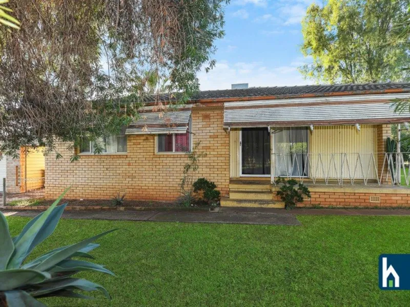 Easy Care Three-bedroom Brick Home