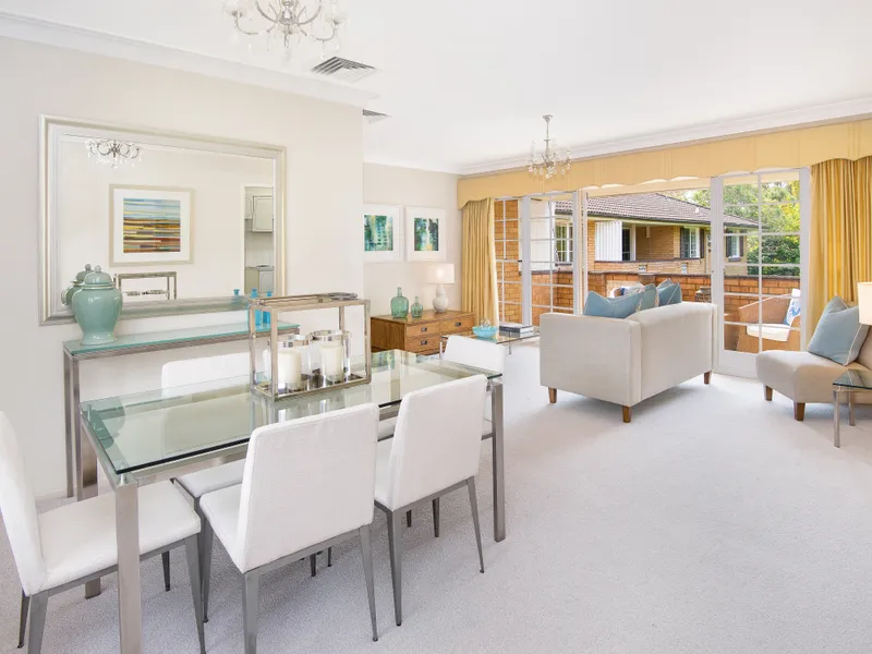 QUIET & SUN FILLED APARTMENT SET WELL BACK FROM THE HIGHWAY