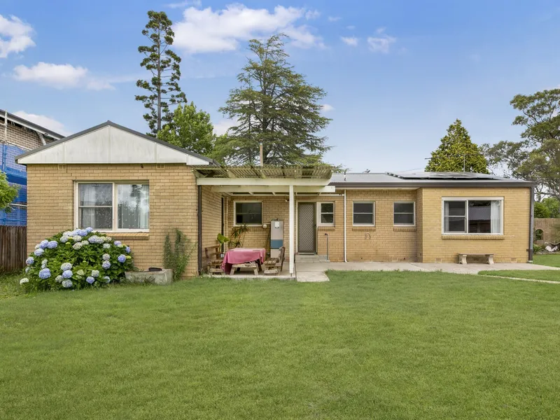 Family Friendly four bedroom home with large fenced yard!