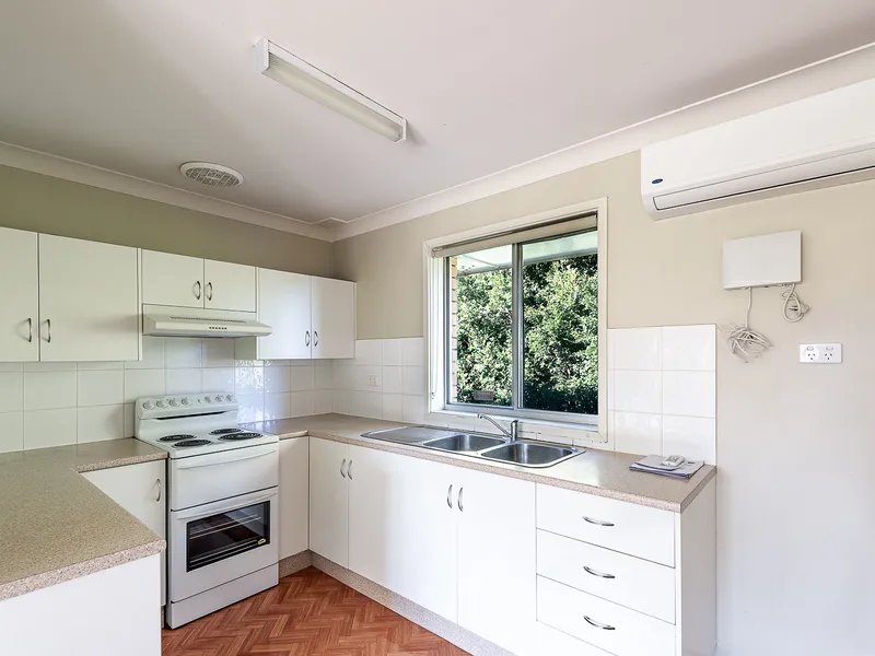 Top floor unit with abundance of natural light.