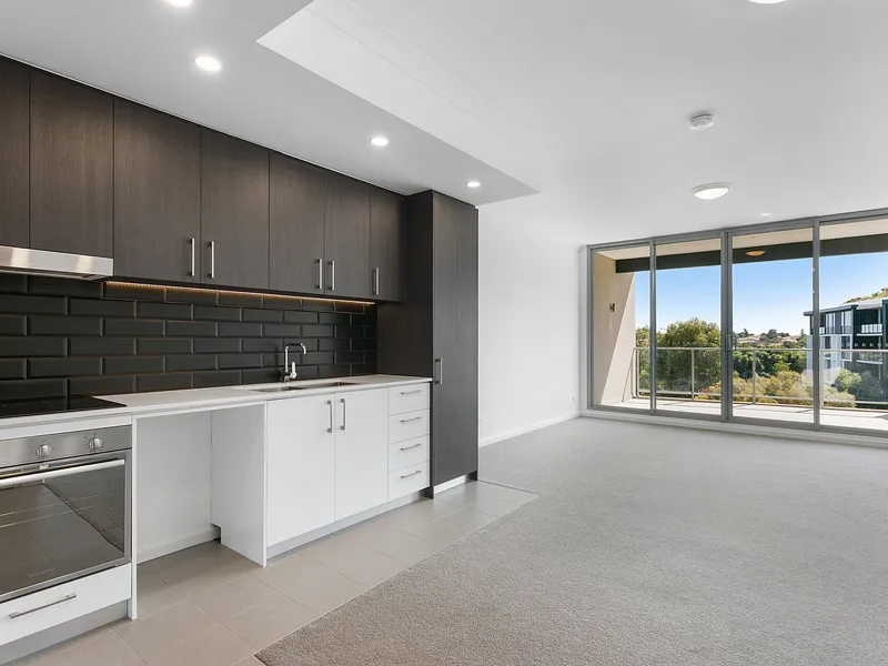 IMPRESSIVE EASY CARE TWO BED APARTMENT WITH TWO CAR BAYS!