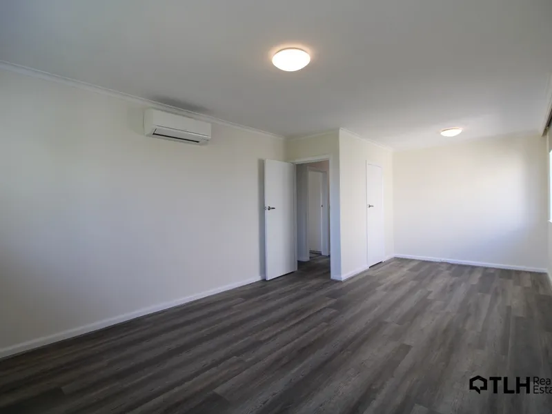 Fully renovated spacious two bedroom one bathroom apartment with stunning treetop views