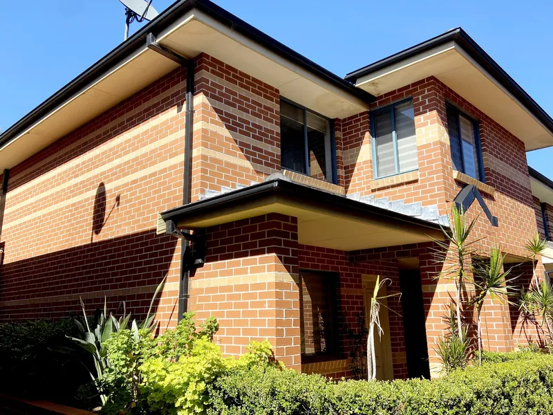 Rear Location Townhome with Double Garage and Workshop