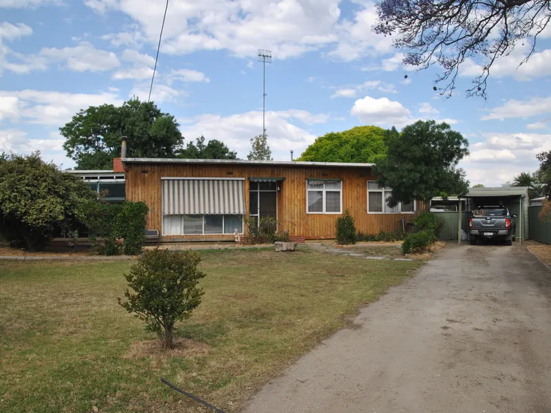 HALF ACRE IN THE MIDDLE OF TOWN