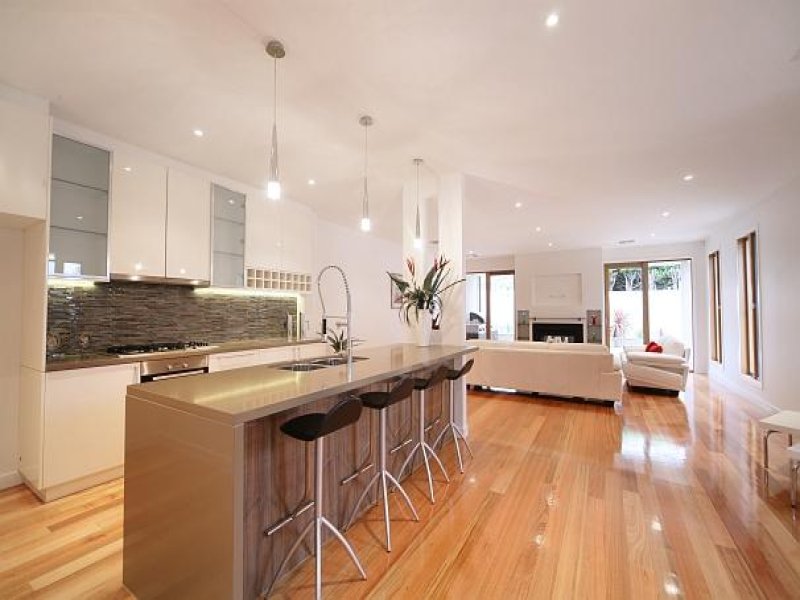 Modern island kitchen design using floorboards - Kitchen Photo 228456